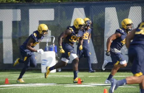wvu players on practice field
